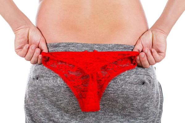 Hombre sosteniendo una tanga roja y masturbándose — Foto de Stock