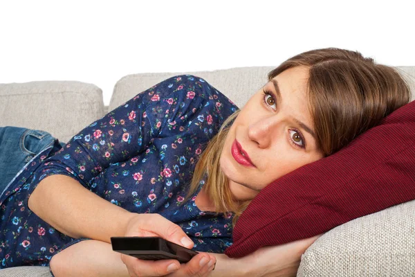 Mujer somnolienta viendo la televisión — Foto de Stock