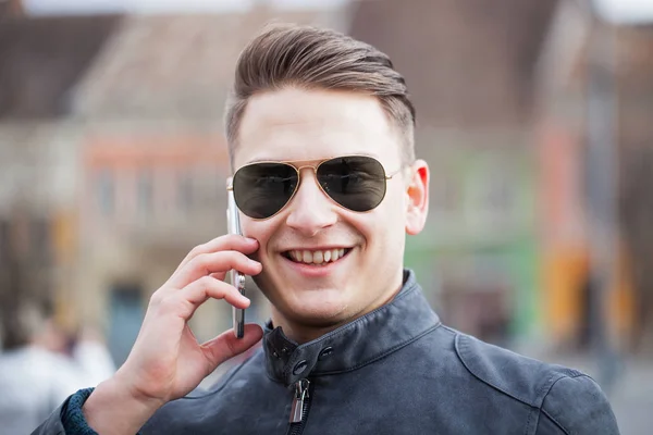 Handsome guy on the phone — Stock Photo, Image