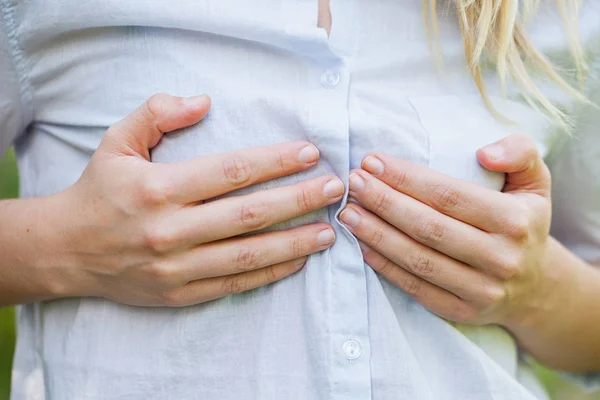 Woman holding her boobs — Stock Photo, Image