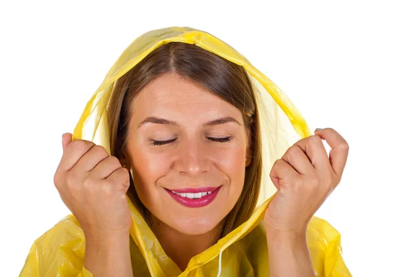 Sarı yağmurluk - izole giyen çekici kadın — Stok fotoğraf