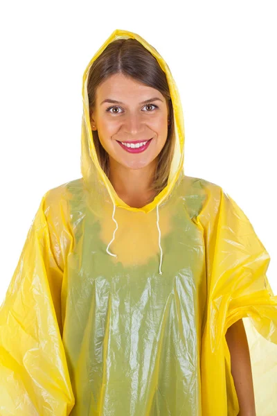Привлекательная женщина в жёлтом плаще - изолированная — стоковое фото
