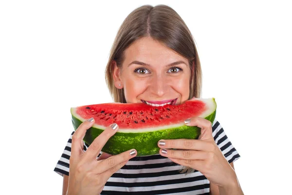 Kobieta jedzenie duży kawałek arbuza — Zdjęcie stockowe