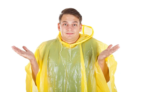 Sarı yağmurluk giyen genç adam — Stok fotoğraf