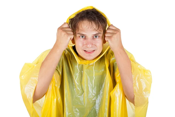 Young man wearing a yellow raincoat — Stock Photo, Image