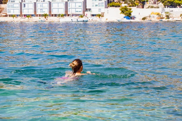 Woman swimming in the sea, Croatia — Stock Photo, Image