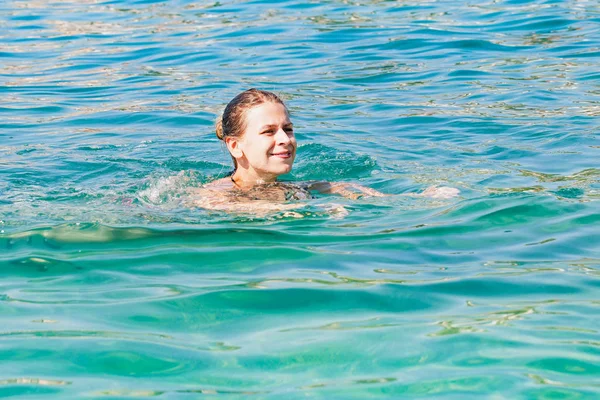 Woman swimming in the sea, Croatia — Stock Photo, Image