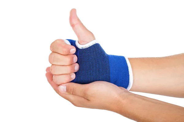 Männliche Hand mit elastischem Verband Daumen hoch — Stockfoto