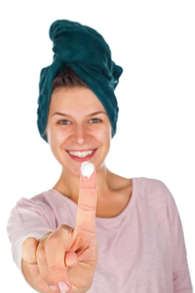 Female applying skin moisturizer - isolated — Stock Photo, Image