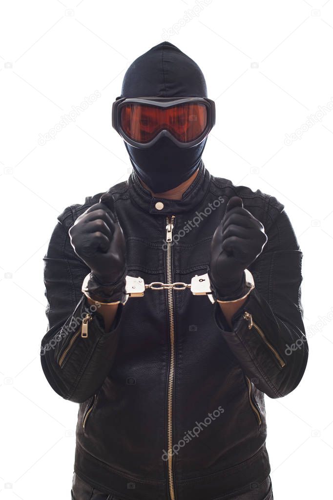 Dangerous criminal with handcuffs