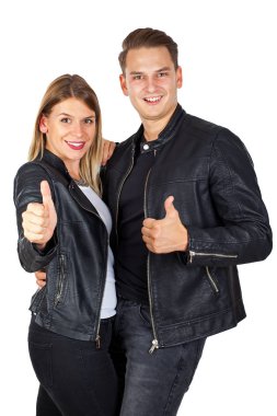 Şık genç Çift başparmak yukarıya