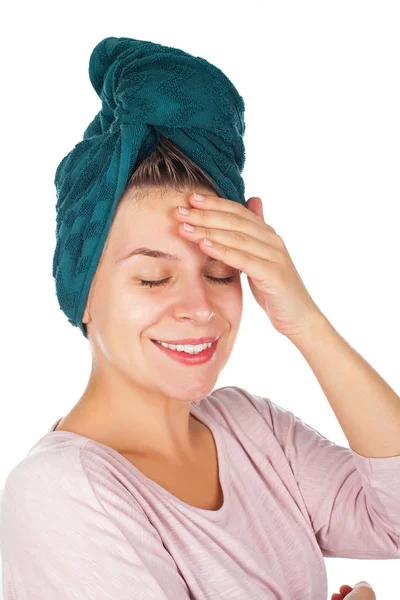 Female applying face moisturizer — Stock Photo, Image