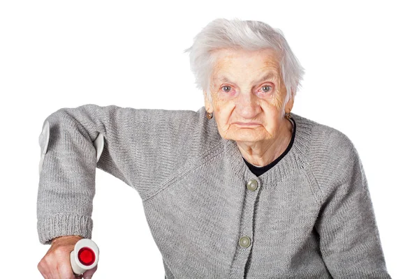 Disabled elderly woman with crutch — Stock Photo, Image