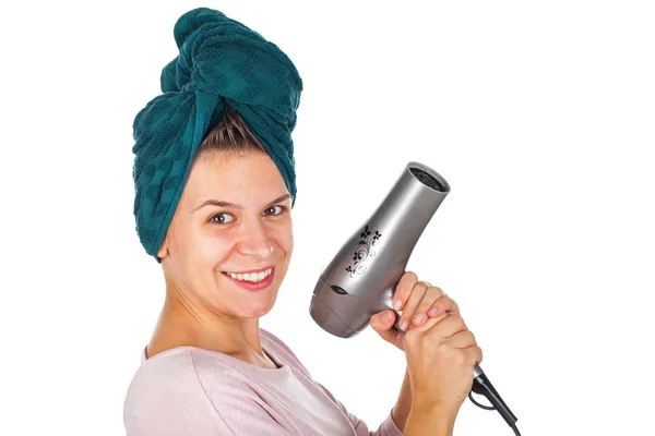 Smiling woman blow drying her hair — Stock Photo, Image