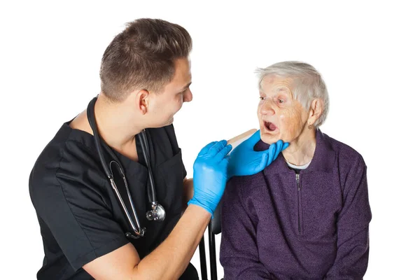 Senior woman with physician on isolated — Stock Photo, Image