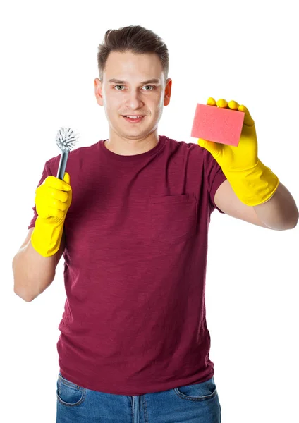 Fiatalember takarítja a házat. — Stock Fotó