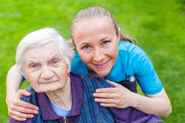 Spending time outdoor with caregiver — Stock Photo, Image