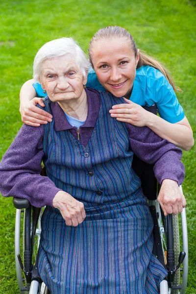 Spending time outdoor with caregiver — Stock Photo, Image