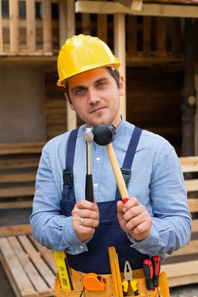 Handsome Young Repairman Holding Construction Tools Front Wooden Background Stock Picture