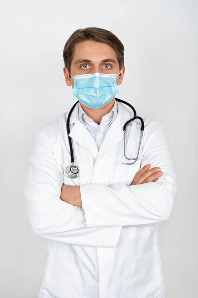 Handsome Young Physician Wearing Surgical Mask Looking Camera Front White — Stock Photo, Image