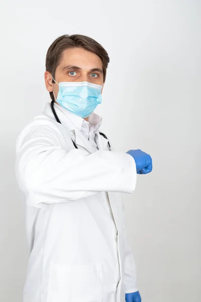 Handsome Young Physician Wearing Surgical Mask Looking Camera Front White — Stock Photo, Image