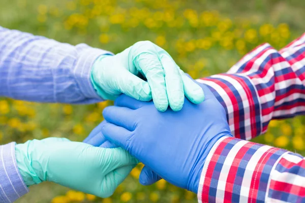 Holding Hands Wearing Gloves Because Covid Pandemic Caregiver Holding Elderly — Stock Photo, Image