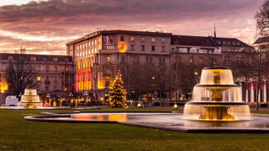 Wiesbaden Kurhaus and Casino Building with the colors of the sunset, in a winter day with the fountains and the Bowling Garden clipart