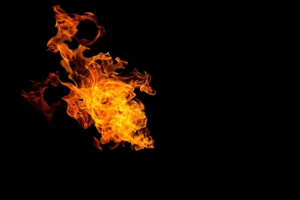 Patrones de fuego. Llamas sobre un fondo negro. Patrones ardientes. Llama ardiente. Fuego ardiente. fénix , —  Fotos de Stock