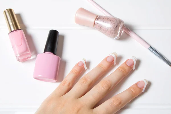 Woman Glues Stickers Her Nails French Manicure Girl Applies Nail — Stock Photo, Image