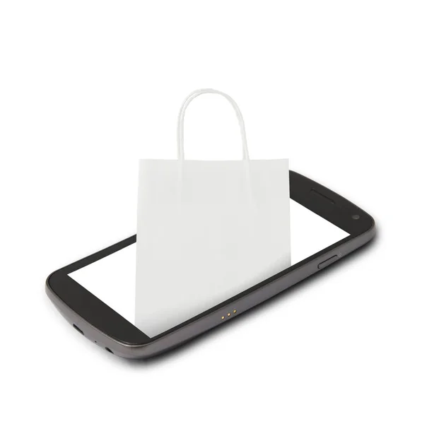 Bolso de papel blanco para compras en smartphone —  Fotos de Stock