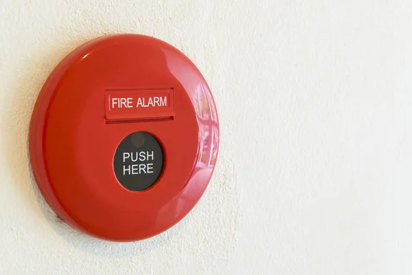 Fire alarm button on a wall