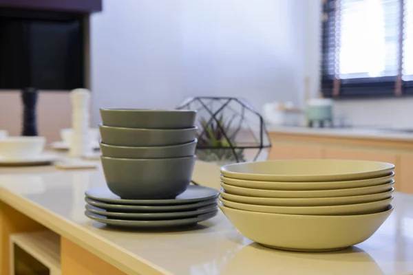 Group of dishes on table in kitchen