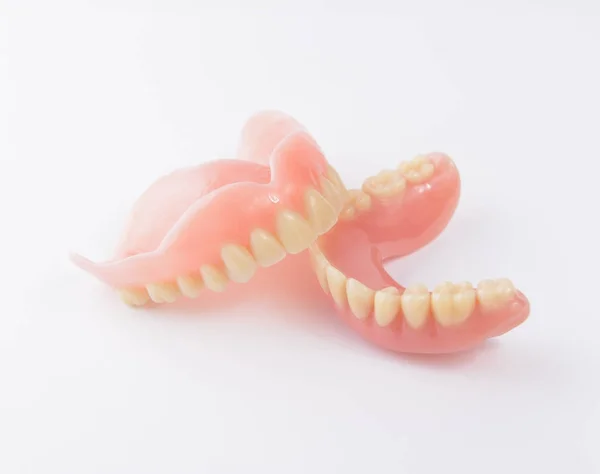 Complete denture on white background — Stock Photo, Image