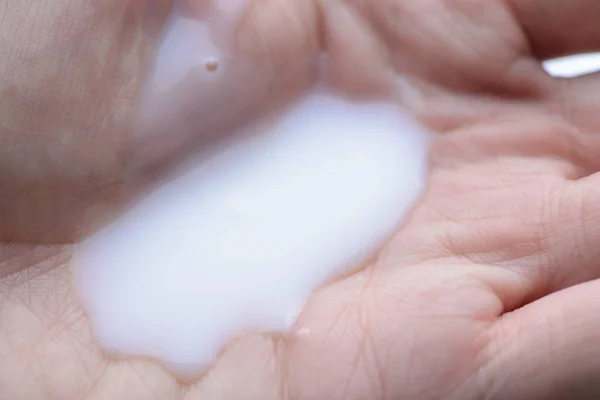 Man hand with liquid soap on hands