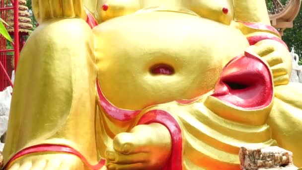 Golden Smiling Fat Buddha Image Sitting Position Statue — Stock Video