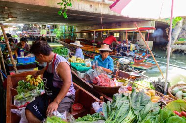 Bangkok, Thailand - January 26, 2020 : Thai people working at Khlong Lat Mayom floating market close to Bangkok