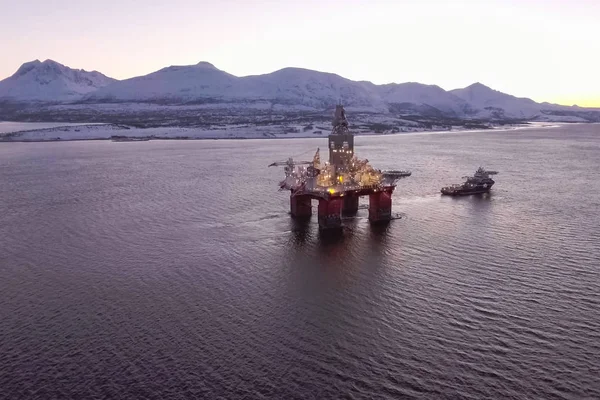 Drilling platform in the port. Towing of the oil platform.