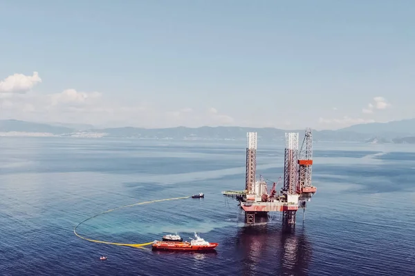 Drilling platform in the port. Towing of the oil platform.