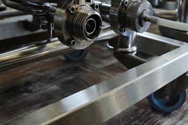 Small brewery. Equipment for brewing beer. Stainless steel on brewing equipment.