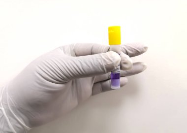 Holding Vial Contains Spore Bacteria clipart
