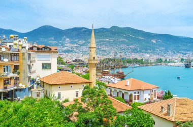 Alanya cityscape with old minaret clipart