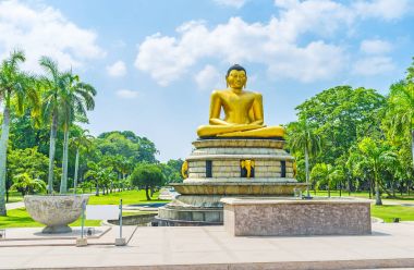 Buddha statue in park of Colombo clipart
