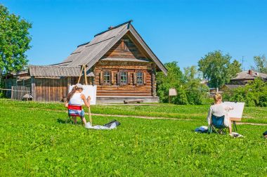 Genç ressam içinde Suzdal Müzesi ahşap Mimarlık