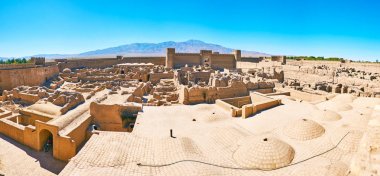 Overlook the medieval Rayen Fortress, Iran clipart