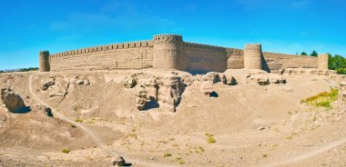 Panorama of outer walls of Rayen fortress, Iran clipart