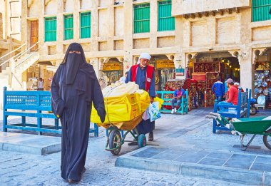 Porter ve müşteri, Souq Waqif, Doha, Qatar