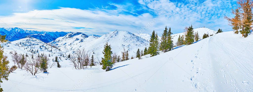 Panorama with white peaks and groomed run, Feuerkogel Mountain, 