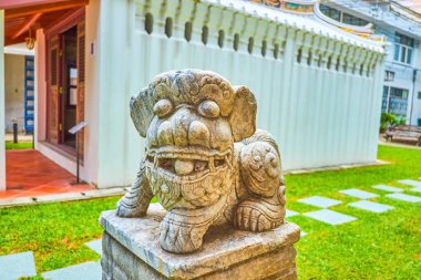 Bangkok 'taki Ulusal Müze' deki Çin tapınağındaki taş yemek köpeği.