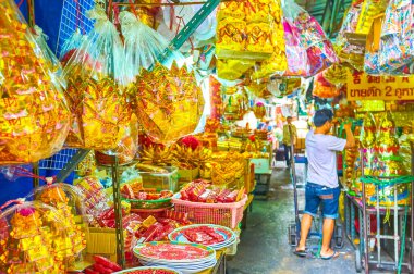 The religious goods market in Chinatown of Bangkok, Thailand clipart