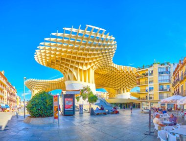 Modern Metropol Parasol among old houses in Seville, Spain